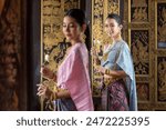 Portrait women in traditional clothing , Asia woman in Thai dress traditional women in traditional Dress on Buddhist on background.  Thai traditional in Ayutthaya Thailand.thai model portrait .