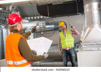 Portrait Of A Worker, Constructing And Checking Development Of A Small Business Hall. Reliable Civil Engineer Working On A Construction Site, Foreman At Work