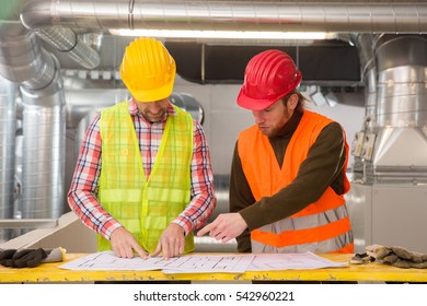 Portrait Of A Worker, Constructing And Checking Development Of A Small Business Hall. Reliable Civil Engineer Working On A Construction Site, Foreman At Work