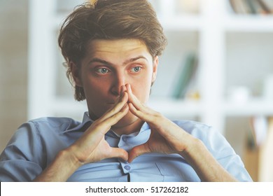 Portrait of  worried young man at workplace. Stress concept - Shutterstock ID 517262182