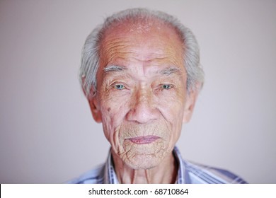 A Portrait Of A Wrinkly Old Chinese Man.