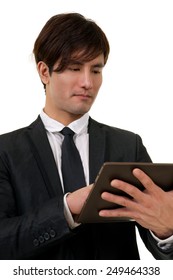 Portrait Of You Asian Business Man Holding Tablet(not IPad) On White Background.