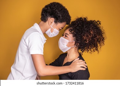 Portrait of young African American mother with toddler son using mask. mother and son wearing mask to protect covid 19, quarantine. Stay at home concept.  - Powered by Shutterstock