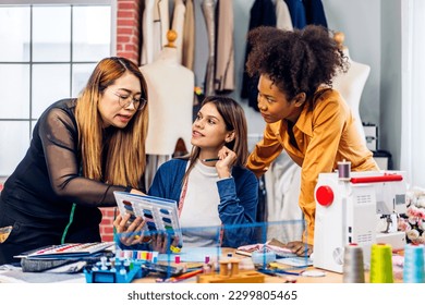 Portrait of young african american woman and young girl fashion designer stylish sitting and working with color samples.Attractive two designer girl work with colorful fabrics at fashion studio - Powered by Shutterstock