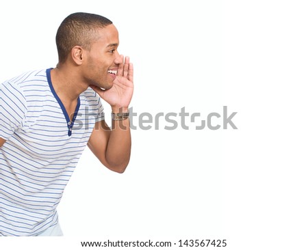 Portrait Of Young African Man Whispering Over White Background