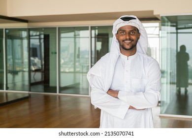Portrait of young African Muslim man wearing religious clothing an scarf - Shutterstock ID 2135070741