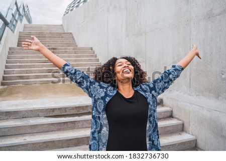 Similar – Image, Stock Photo Young woman arms raised enjoying the fresh air in green forest