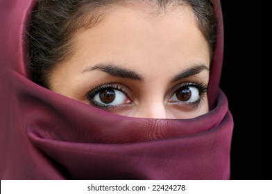 Portrait Of A Young Arab Girl In A Scarf