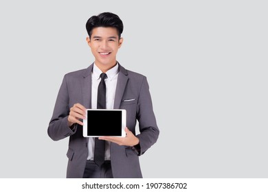 Portrait Young Asian Business Man Showing And Presenting Tablet Computer With Blank With Success Isolated On White Background, Businessman Standing And Holding Touchpad Digital, Communication Concept.