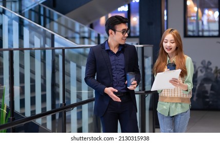 Portrait Of Young Asian Business People At Office