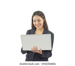 Portrait Of Young Asian Business Woman Holding A Laptop Computer Notebook In Technology Device Isolated On White Background. People Lifestyle.