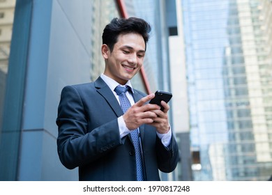 Portrait Of Young Asian Businessman Outside The Office