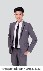 Portrait Young Asian Businessman In Suit With Confident And Friendly Isolated On White Background, Business Man Smart With Success Hand In Pocket, Manager Or Executive With Handsome And Leadership.