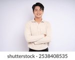 Portrait of young asian businessman wearing sweater and posing on white background