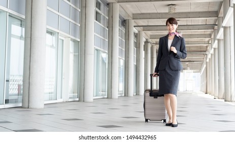 
Portrait Of Young Asian Cabin Crew