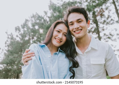 Portrait Of Young Asian Couple Outside