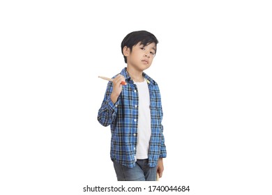 A portrait of a young Asian elementary school student wearing a plaid shirt and a drumstick. An isolated image with white background. - Powered by Shutterstock