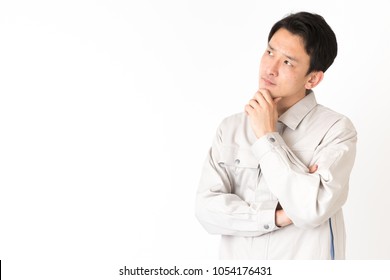 Portrait Of Young Asian Engineer Worker Isolated On White Background