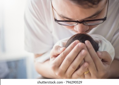 Portrait Of Young Asian Father With His Newborn Baby, Copy Space With Bed In The Hospital Background. Closeup Daddy And Baby Love Family Single Dad Concept