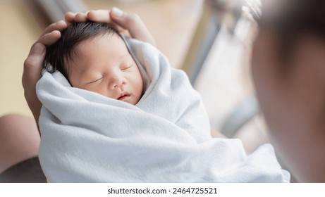 Portrait of young asian father or mother with healthy newborn baby, copy space with bed in hospital background. Single caucasian dad, happy family healthcare and father's day concept top view banner - Powered by Shutterstock