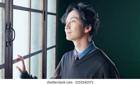 Portrait Of Young Asian Man.