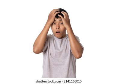 Portrait Of Young Asian Man Feeling Disappointed, Unhappy And Negative Gesture. Human Emotion Face Expression Concept. Studio Shot Isolated On White Background. Copy Space.