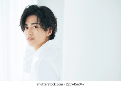 Portrait of young Asian man. Men's beauty concept. Men's cosmetics. - Shutterstock ID 2259456347