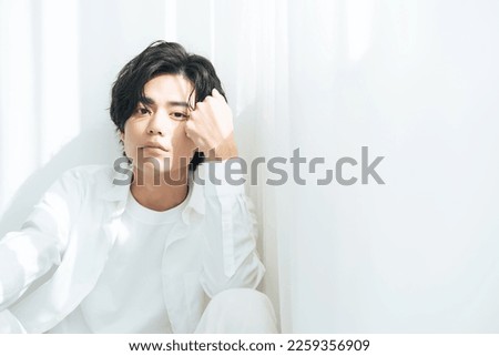 Portrait of young Asian man. Men's beauty concept. Men's cosmetics.