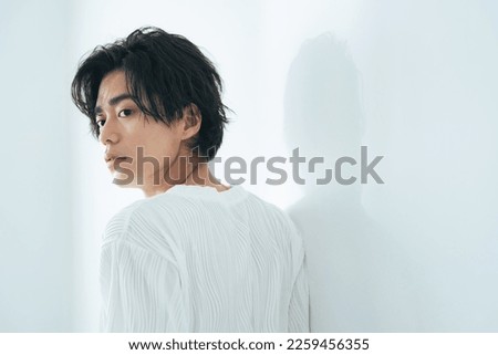 Portrait of young Asian man. Men's beauty concept. Men's cosmetics.