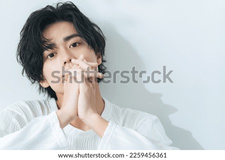 Portrait of young Asian man. Men's beauty concept. Men's cosmetics.