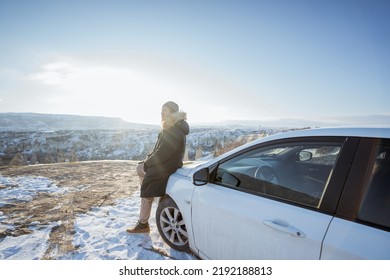 Portrait Of Young Asian Man On His Adventure Going To Beautiful Hill In Cappadocia In Winter By His Car