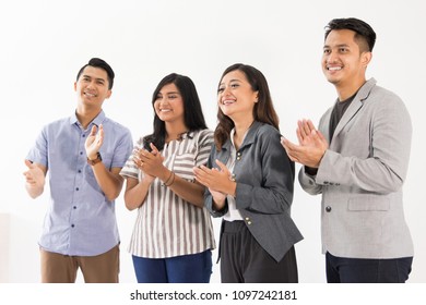 Portrait Of Young Asian People Clapping Their Hand Together