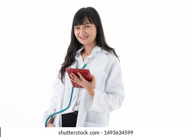 Portrait Of Young Asian Woman Doctor Look At Camera While Smiling Holding IPad Gadget. Copy Space Isolated White Background. 