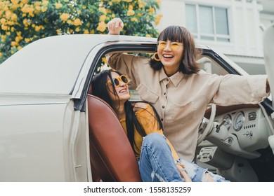Portrait of young asian woman friends smiling with happy on road trip.