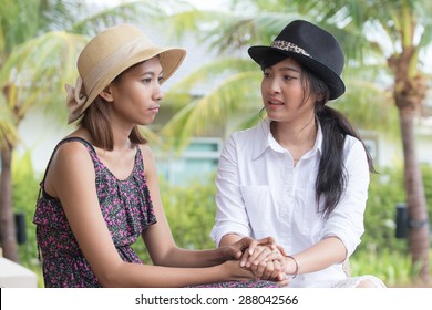 Portrait Of Young Asian Woman Friends Talking To Consult Seriously Problem And Cheer Up To Fight A Trouble