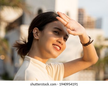 Portrait Of Young Asian Woman Hand To Covering Her Face From Sunlight, Shadow And Light On Woman Face, Authentic People, Smiling, Candid, Sunset, Beautiful, Cafe