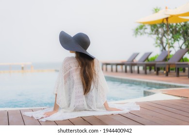 Portrait Young Asian Woman Happy Smile Relax Around Outdoor Swimming Pool In Hotel Resort For Travel Vacation