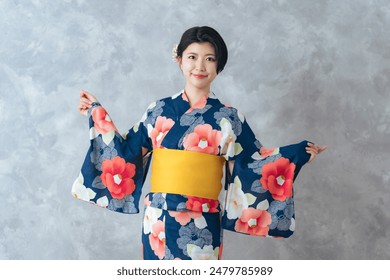 Portrait of young Asian woman wearing Yukata(Japanese traditional summer kimono clothes).