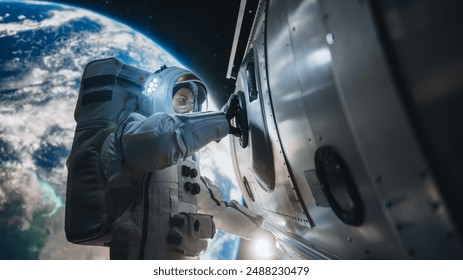 Portrait of Young Astronaut Posing in a Space Suit During a Spacewalk Outside a Spaceship, Satellite or a Station. Spaceman Closing Down The Entrance Hatch Of The International Space Station - Powered by Shutterstock