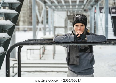 Portrait Of Young Athletic Woman During Her Winter Workout Outside