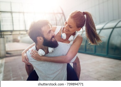 Portrait Of Young Attractive Happy Fitness Couple