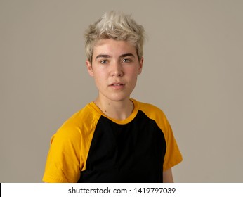 Portrait Of Young Attractive Stylish Fashion Teenager Confident And Happy With His Gender Identity. Trans Boy Posing In Cool Urban Fashion T Shirt. In Beauty, Transgender People And Equality Concept.