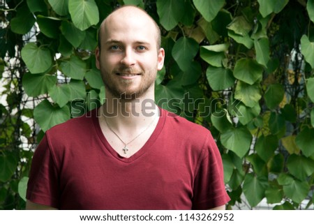 Portrait of young bald head man