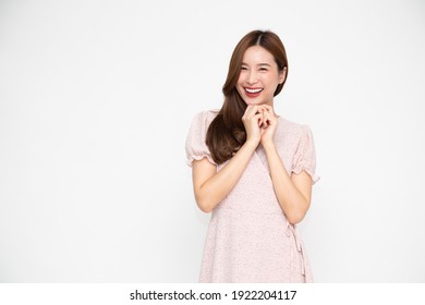 Portrait of Young beautiful Asian businesswoman standing and smiling isolated on white background, Looking at camera - Shutterstock ID 1922204117