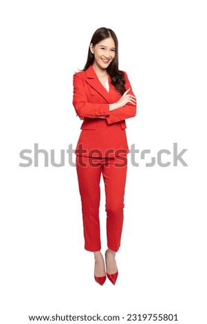 Portrait of Young beautiful Asian businesswoman in red suit standing and smiling isolated on white background, Full body composition
