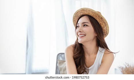 Portrait Of Young Beautiful Asian Woman On Holiday Vacation Summer Time In White Bedroom. Happy Cheerful Relaxing Girl In Summer. Korean Makeup Skincare University, Woman Fashion Lifestyle Concept.