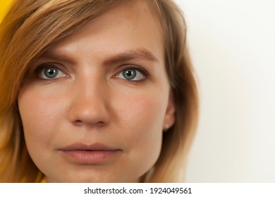portrait of a young beautiful blonde girl, beautiful girl looking at you