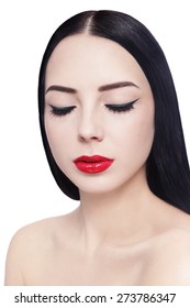 Portrait Of Young Beautiful Brunette With Cat Eyes Eyeliner And Red Lipstick Over White Background