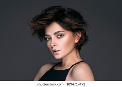 Portrait Of A Young Beautiful Brunette Girl With Short Stylish Hair