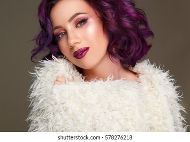 Portrait Of Young Beautiful Fashion Model With Purple Hair